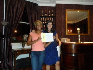 Helen receiving her participation award